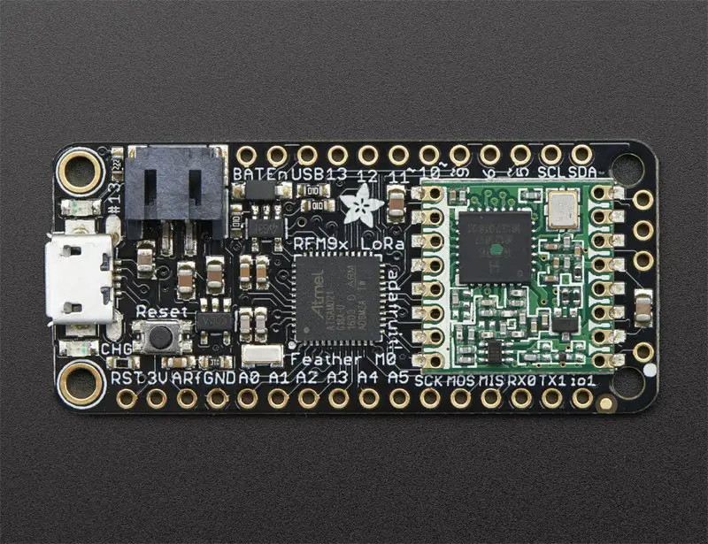 Two matching Feather M0 LoRa boards — source hardware reference
