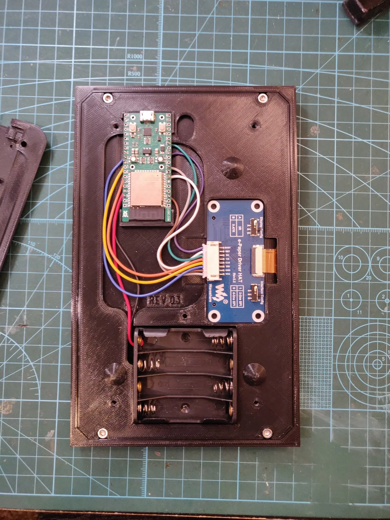 The rear view shows how the author fitted the electronics behind the display.