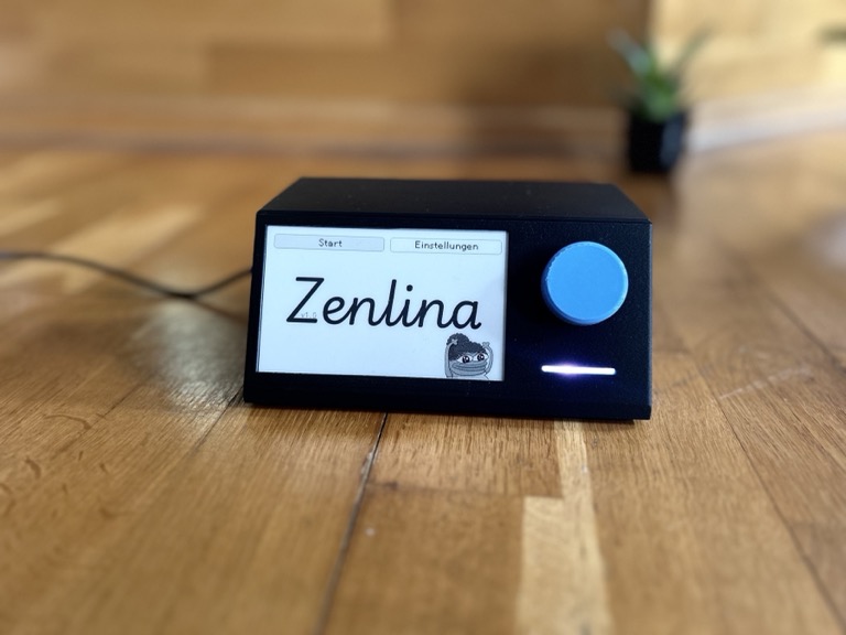 The original rotary-dial Pomodoro timer with its e-paper face.